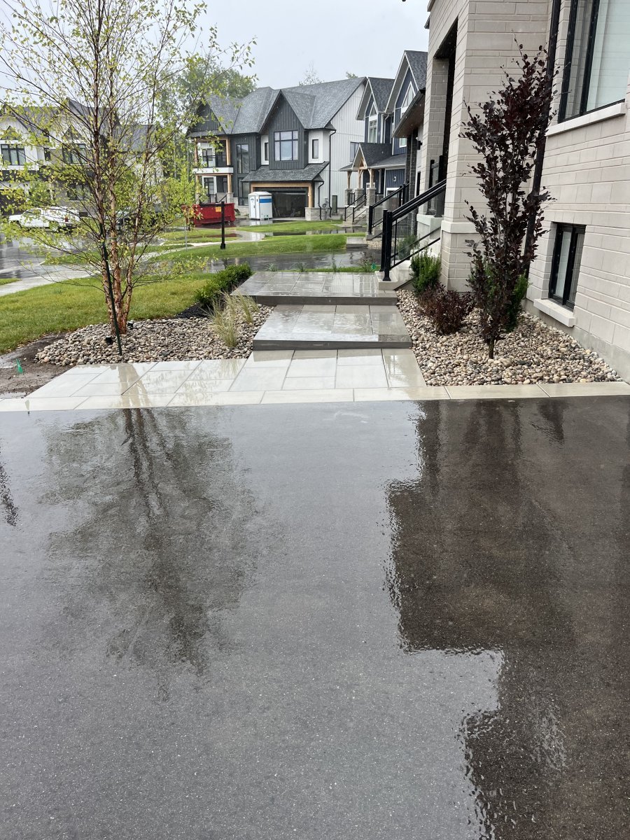 Porcelain Walkway & River Rock Beds